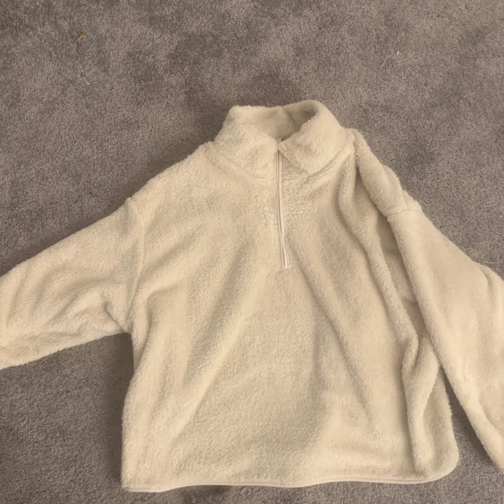 white fuzzy sweater
